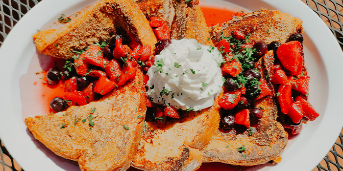 Custard french toast covered in fresh fruit made famous by B66 the best brunch restaurant in Flagstaff, Arizona.